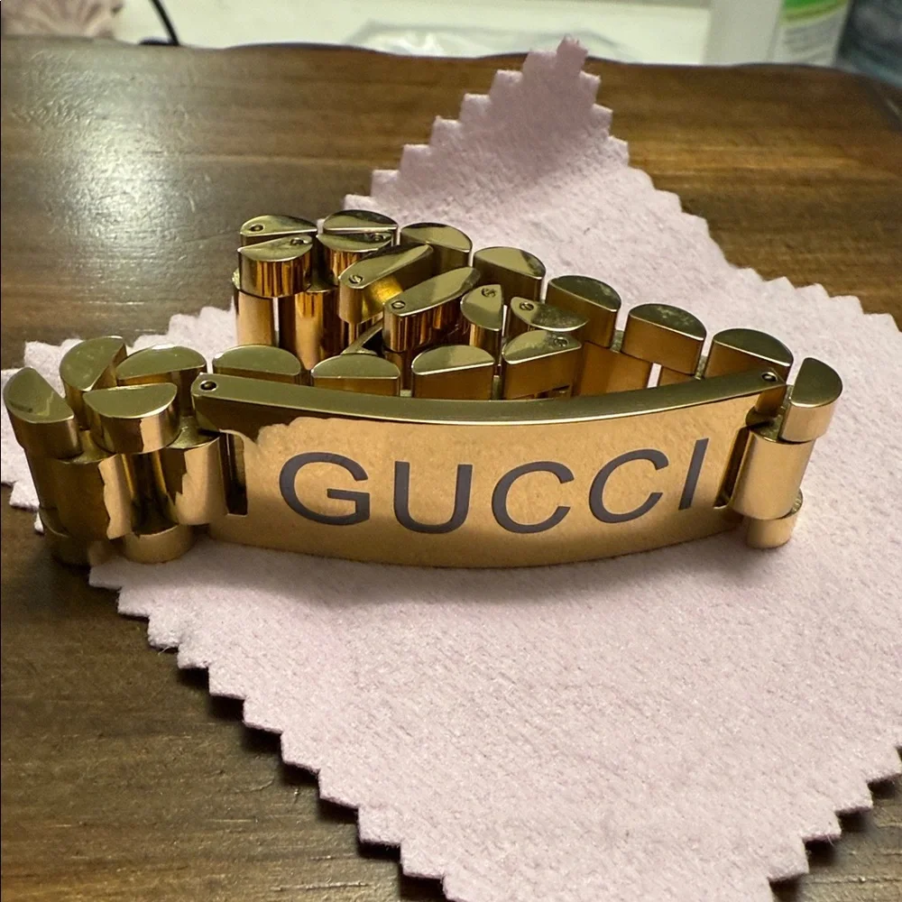 Gucci Gold Men's Bracelet with Black Lettering